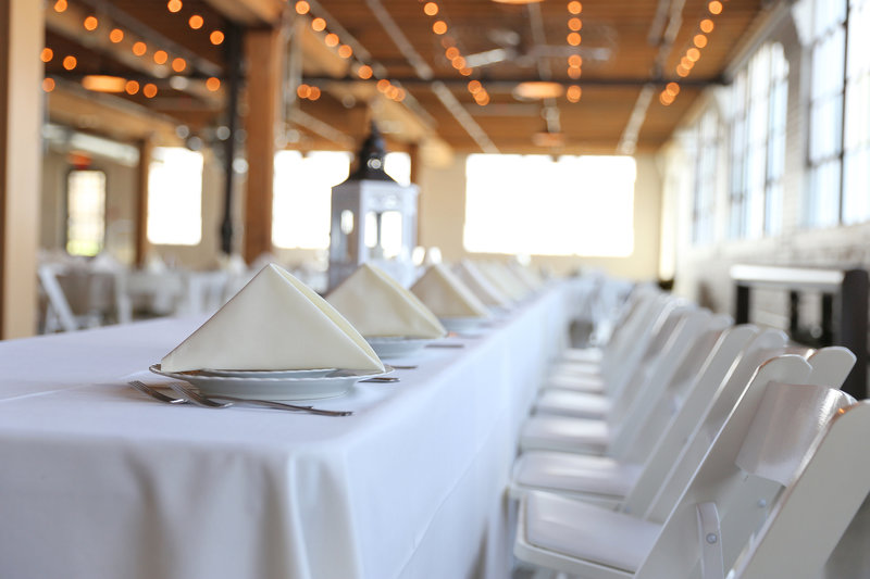 Banquet table with white linens